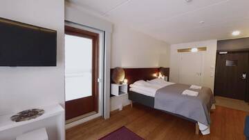 Фото номера Четырехместный номер &quot;Комфорт&quot; Отель Hotel Arctic Zone г. Рука 4