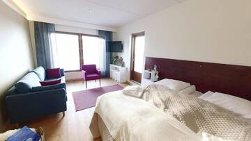 Фото номера Четырехместный номер &quot;Комфорт&quot; Отель Hotel Arctic Zone г. Рука 11