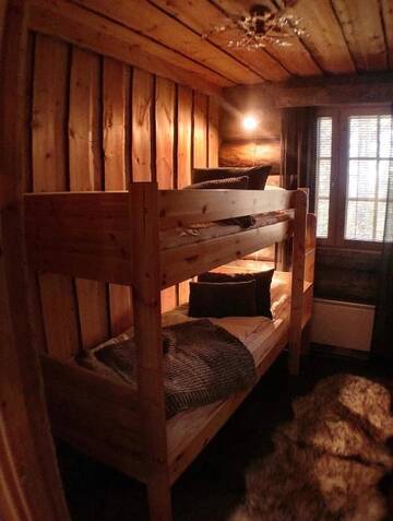 Фото номера Дом с 3 спальнями Дома для отпуска Ruka Chalet Plage Oliver г. Рука 53