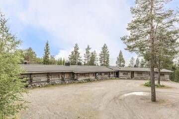 Фото номера Коттедж с сауной и 4 спальнями Дома для отпуска Ruka Safaris - Karhun Maja г. Рука 22