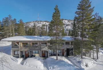 Фото номера Коттедж с сауной и 4 спальнями Дома для отпуска Ruka Safaris - Karhun Maja г. Рука 30