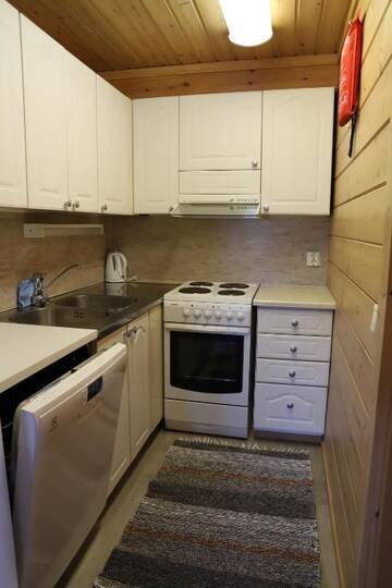 Фото номера Коттедж с 1 спальней и сауной Дома для отпуска Matkailumaja Heikkala Cottages г. Рука 15