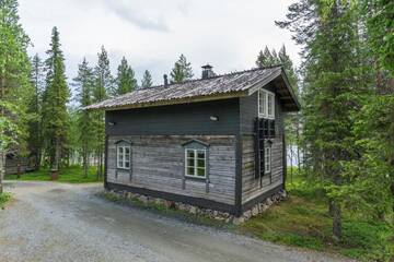 Фото номера Дом для отпуска с 5 спальнями и видом на озеро Дома для отпуска Ruka Safaris - Alinan Tupa г. Рука 37