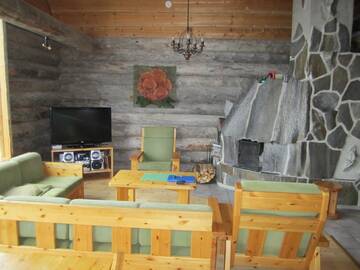 Фото номера Коттедж с 5 спальнями и сауной Дома для отпуска Rukajärven Kelopirtit Cottages г. Рука 8