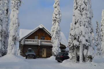 Фото номера Коттедж с 5 спальнями и сауной Дома для отпуска Rukajärven Kelopirtit Cottages г. Рука 45