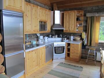 Фото номера Коттедж с 5 спальнями и сауной Дома для отпуска Rukajärven Kelopirtit Cottages г. Рука 11