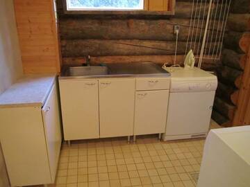 Фото номера Коттедж с 5 спальнями и сауной Дома для отпуска Rukajärven Kelopirtit Cottages г. Рука 15