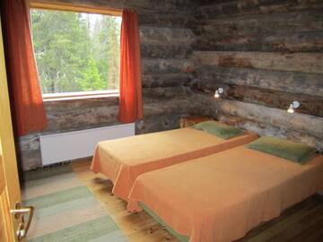 Фото номера Коттедж с 5 спальнями и сауной Дома для отпуска Rukajärven Kelopirtit Cottages г. Рука 12