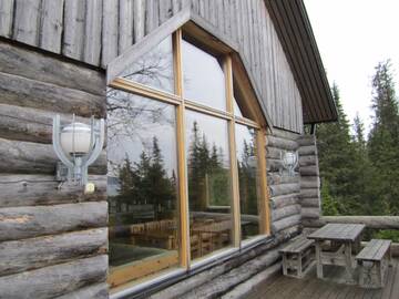 Фото номера Коттедж с 5 спальнями и сауной Дома для отпуска Rukajärven Kelopirtit Cottages г. Рука 7