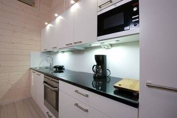 Фото номера Апартаменты с 2 спальнями и сауной Дома для отпуска Rukankarhu Apartment II г. Рука 11