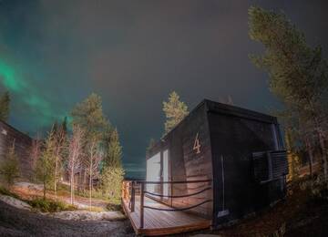 Фото номера Номер-студио с видом на озеро Курортные отели Iisakki Glass Village г. Рука 24