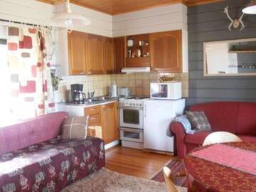 Фото номера Дом для отпуска Дома для отпуска Holiday Home Mustalampi 4 kyyhkynen г. Рука 27