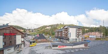 Фото номера Апартаменты с 2 спальнями Апарт-отели Ski-Inn RukaSuites г. Рука 16