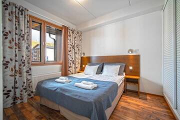 Фото номера Апартаменты с 2 спальнями Апарт-отели Ski-Inn RukaSuites г. Рука 22